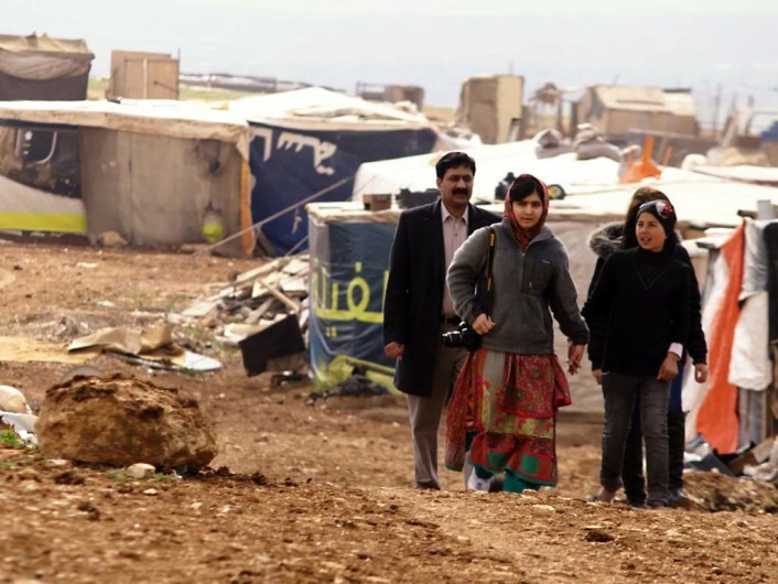 HE NAMED ME MALALA: Ziauddin Yousafzai and Malala Yousafzai and Syrian refugee Rimah in Syrian Refugee Tent Camp in Jordan. Feb 17, 2014.  Photo courtesy of Fox Searchlight Pictures.Â© 2015 Twentieth Century Fox Film Corporation All Rights ReservedÂ 